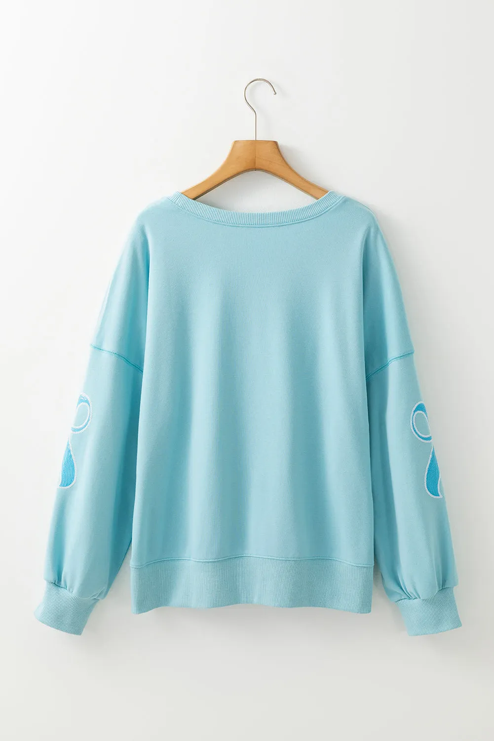 Beau Blue Sequined Bowknot Drop Shoulder Oversized Sweatshirt